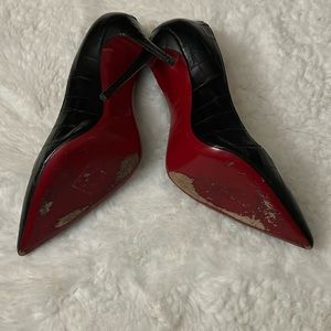 Christian Lou’s black with the black snake skin.